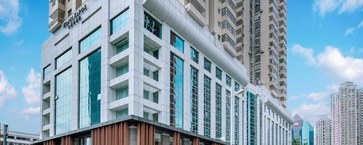 Check in the tranquil paradise of Luohu Cotton Blossoms amidst the hustle and bustle of the city